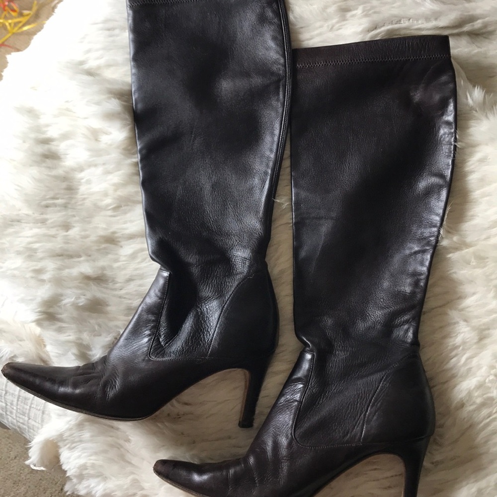 Brown leather Cole Han boots.